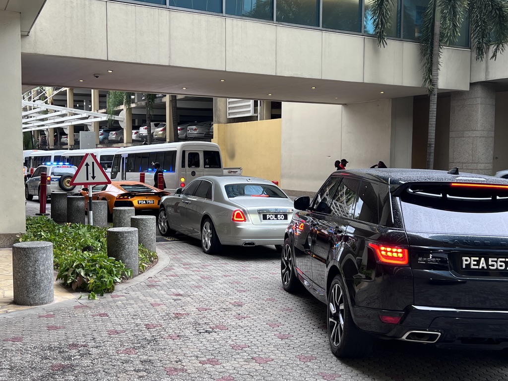 ESS motorcade arrival with luxury vehicles