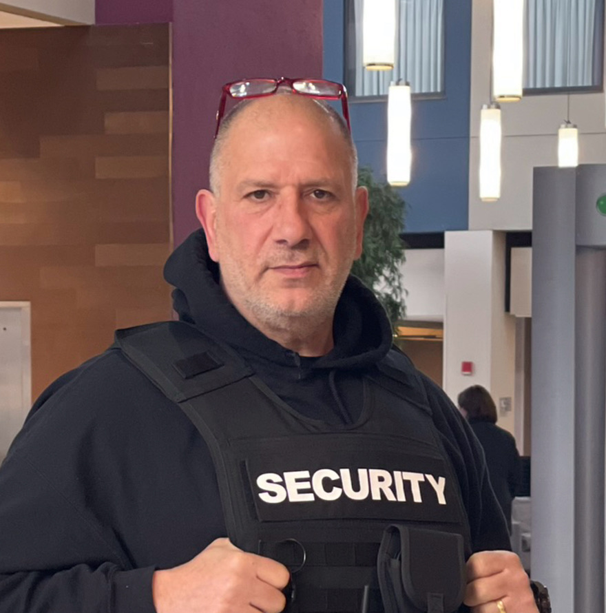 ESS tactical officer in protective vest on post